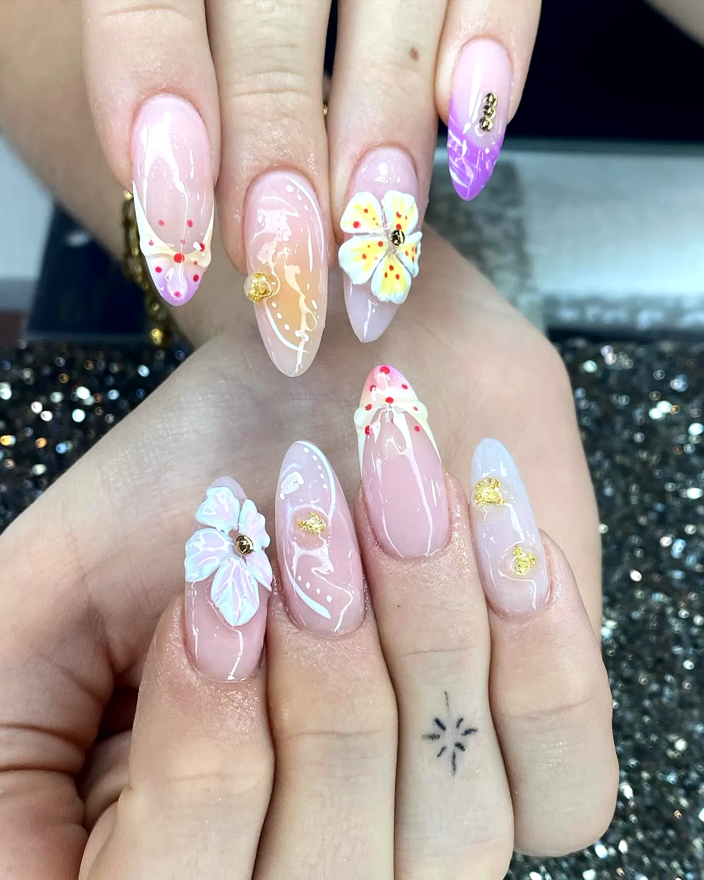 Stunning Almond Shaped Sunflower Nail Designs Featuring Soft Pink Base and Elegant Floral Patterns