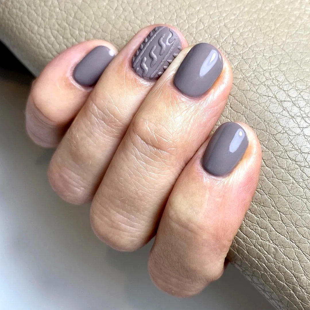 Stylish Almond Shaped Gray Nails with Textured Accent Design