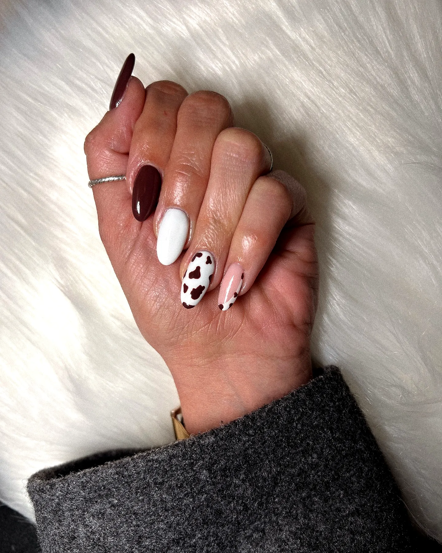 Stylish Animal Print Nails with Almond and Stiletto Shapes in Deep Burgundy and White