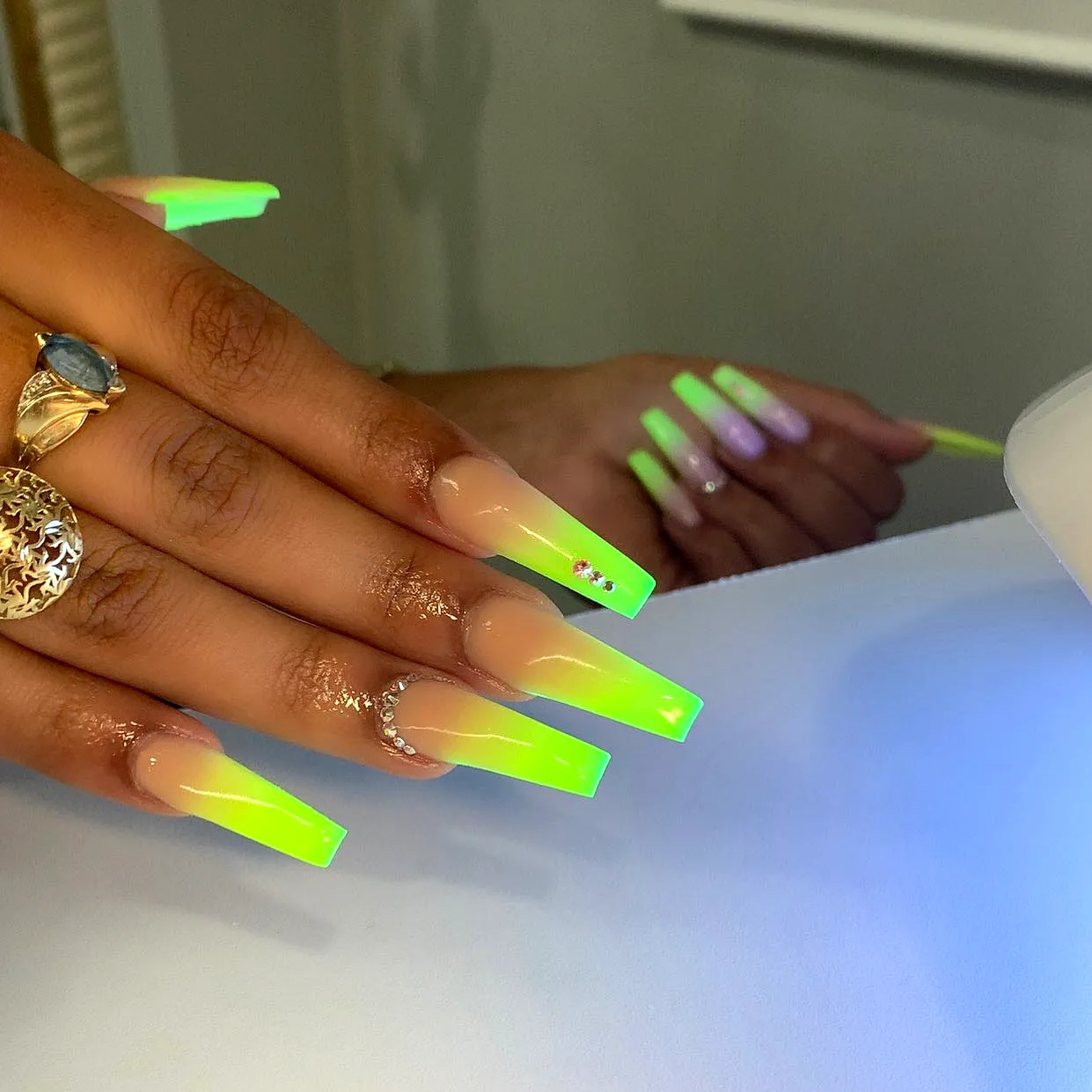 Stylish Long Square Neon Nails with Ombre Green and Rhinestone Accents