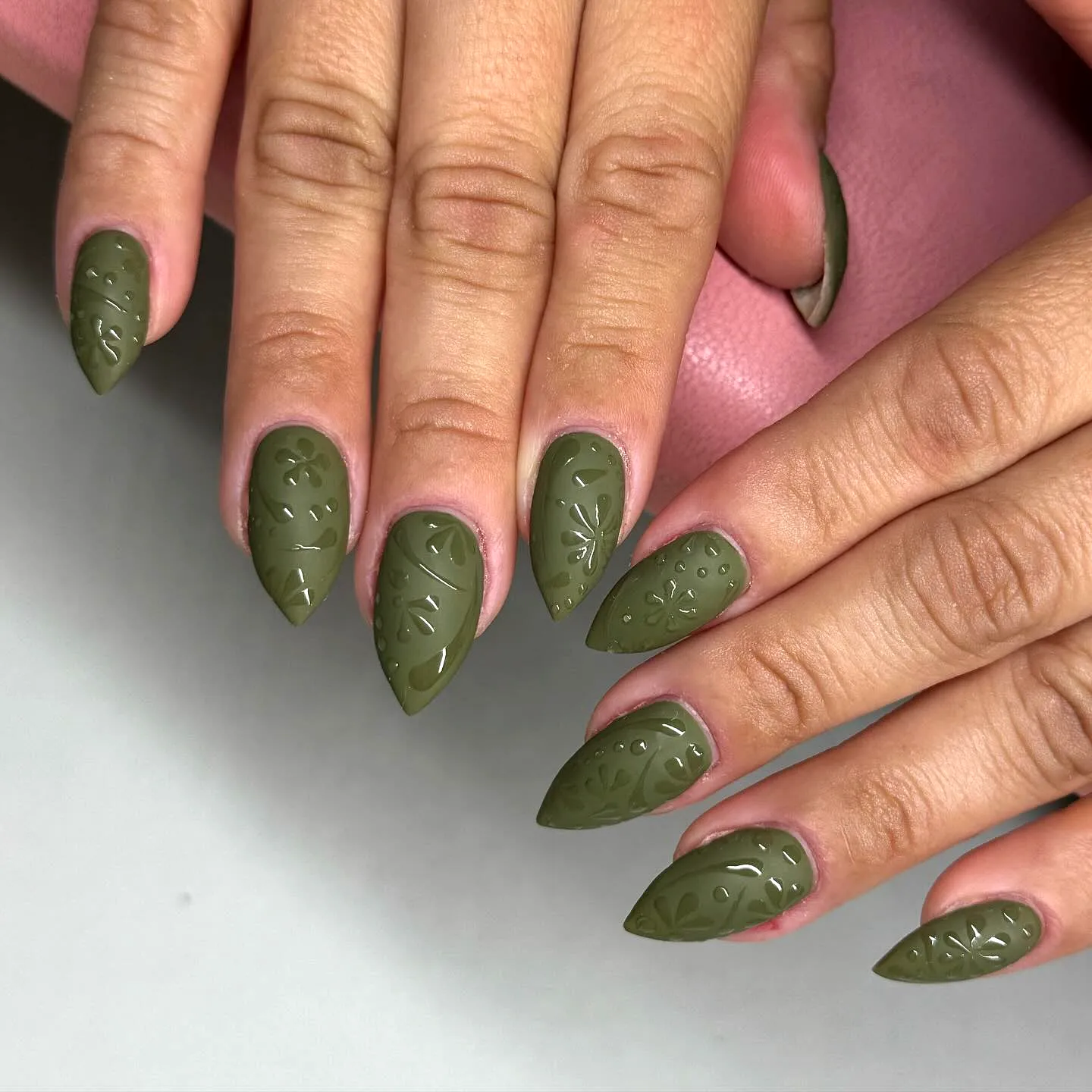 Stylish Matte Olive Green Almond-Shaped Nails with Intricate Leaf and Flower Patterns