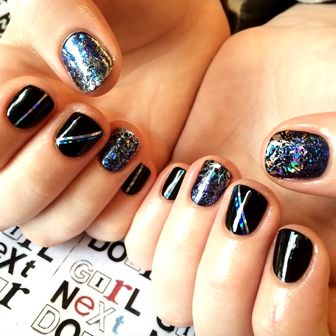 Stylish Oval Black Birthday Nails with Silver and Holographic Patterns