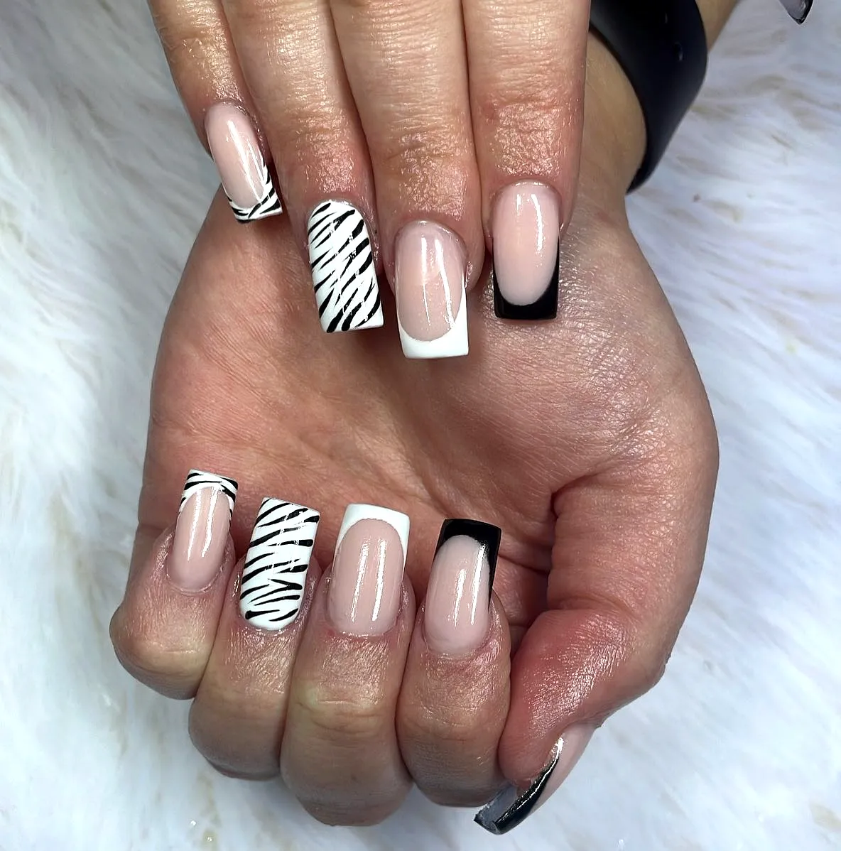 Stylish Square Zebra Print Nails with Glossy Nude Base and Black Tips