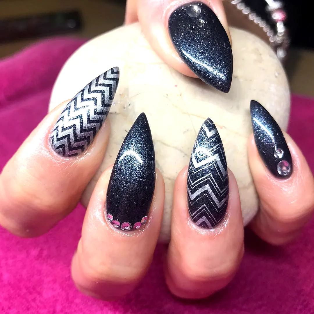 Stylish Stiletto Silver Nail Designs with Black Base and Rhinestone Accents