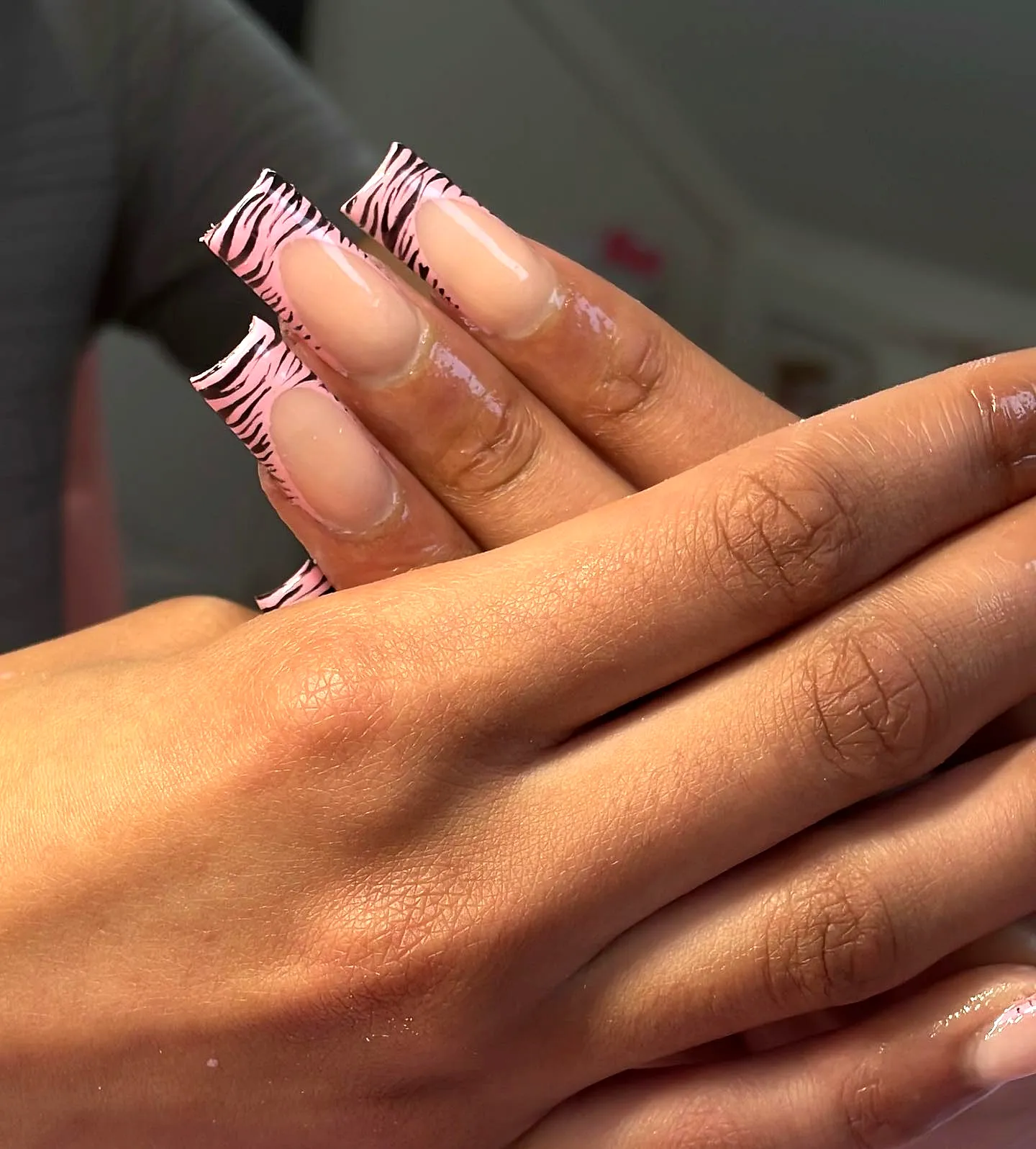 Trendy Long Square Zebra Print Nails in Eye-Catching Pink and Glossy Black Stripes