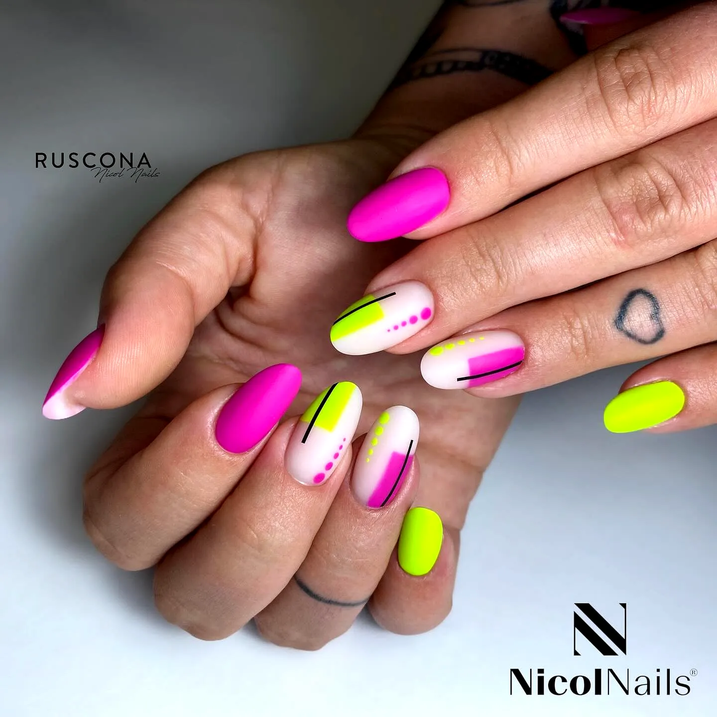 Vibrant Almond Neon Nails with Playful Patterns in Hot Pink and Bright Green
