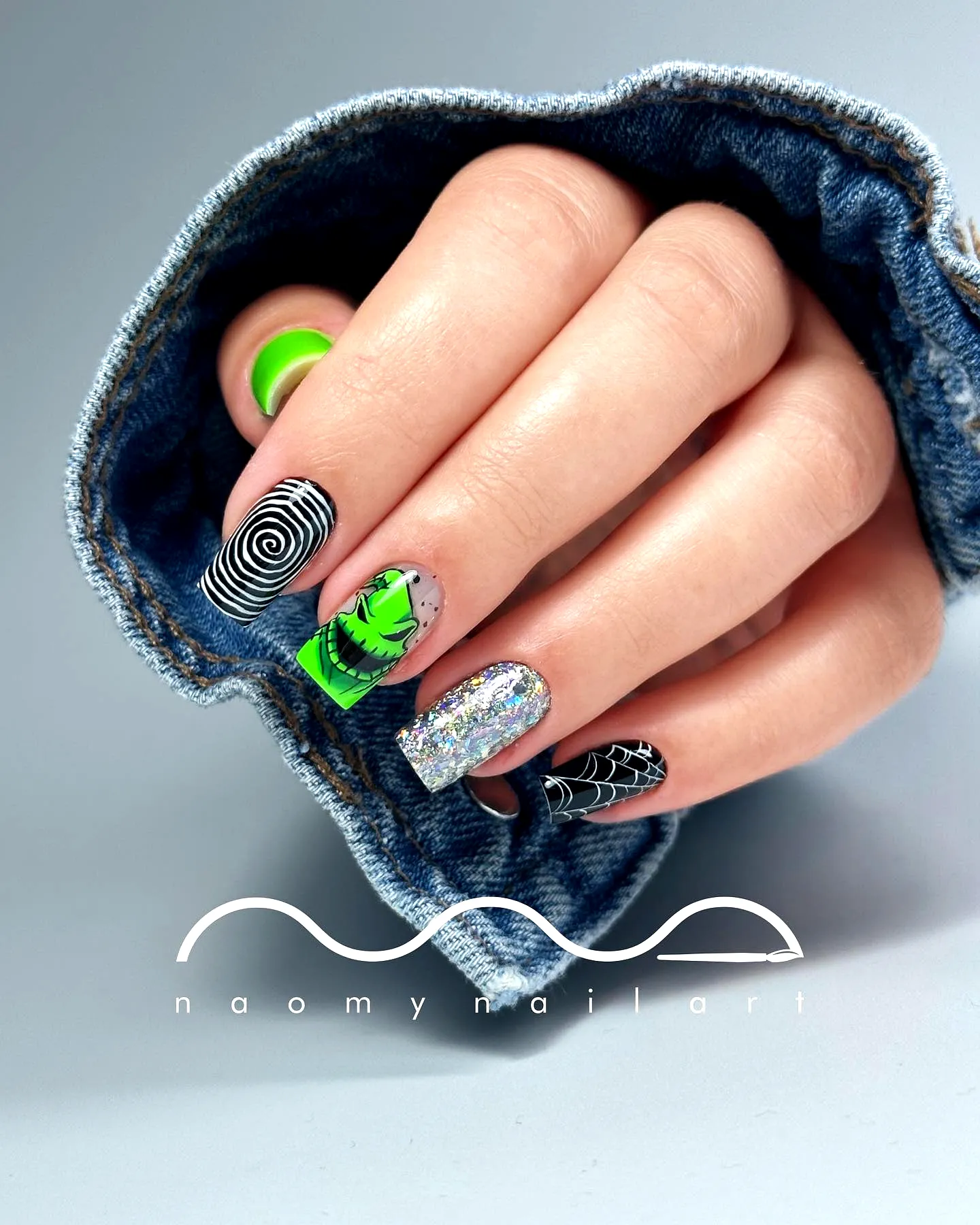 Vibrant Square Nightmare Before Christmas Nails with Spiderweb and Leafy Designs