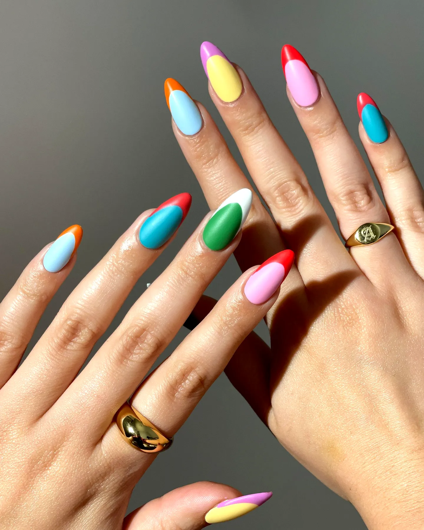 Vibrant Stiletto Tropical Nail Designs with Geometric Color Blocking