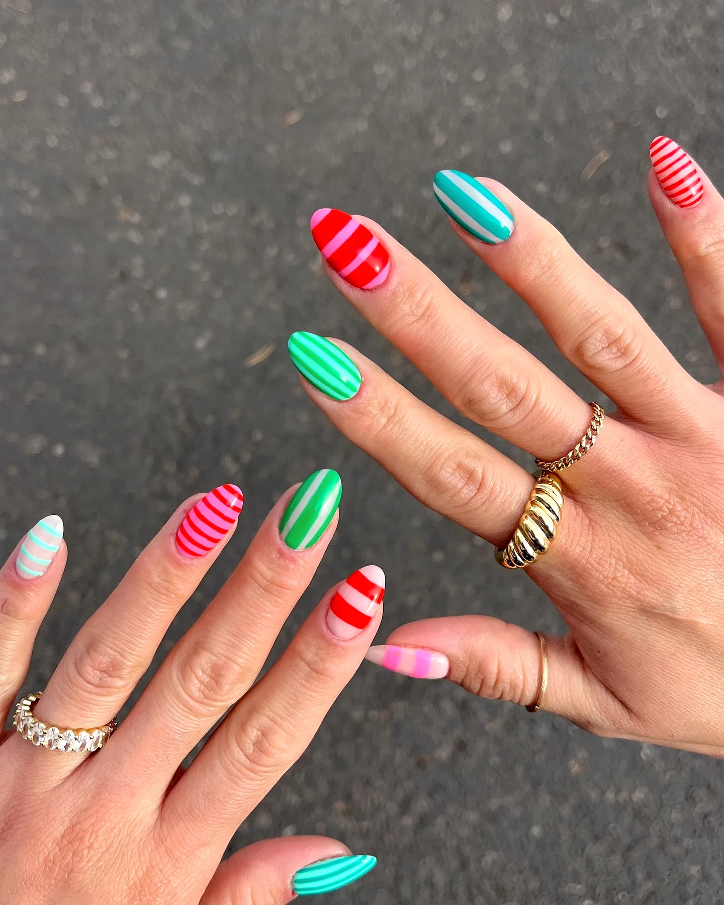 Vibrant Striped Nails in Almond Shape Featuring Colorful Matte and Glossy Finishes